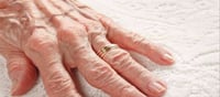 Why does the skin become shiny and thin in old age?